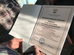 Родителей бойца СВО из поселка Листвянский наградили за воспитание сына
