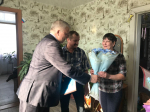 Родителей бойца СВО из поселка Листвянский Елену и Геннадия Найденко поблагодарили за воспитание сына