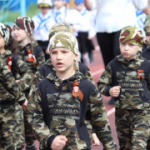 Искитимские дошколята показали мастерство строевой подготовки на стадионе спортивного комплекса «Заря»